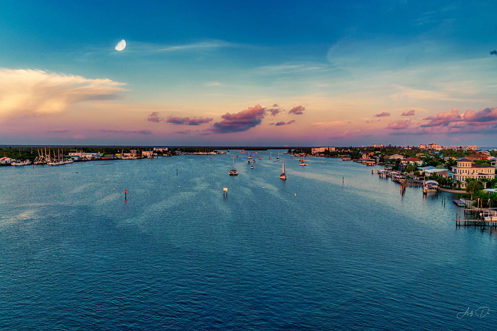 Aerial view of an intracoastal waterway and coastal town at dusk